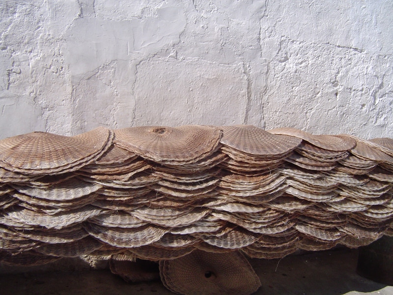 Filters for making olive oil being dried in the sun after washing