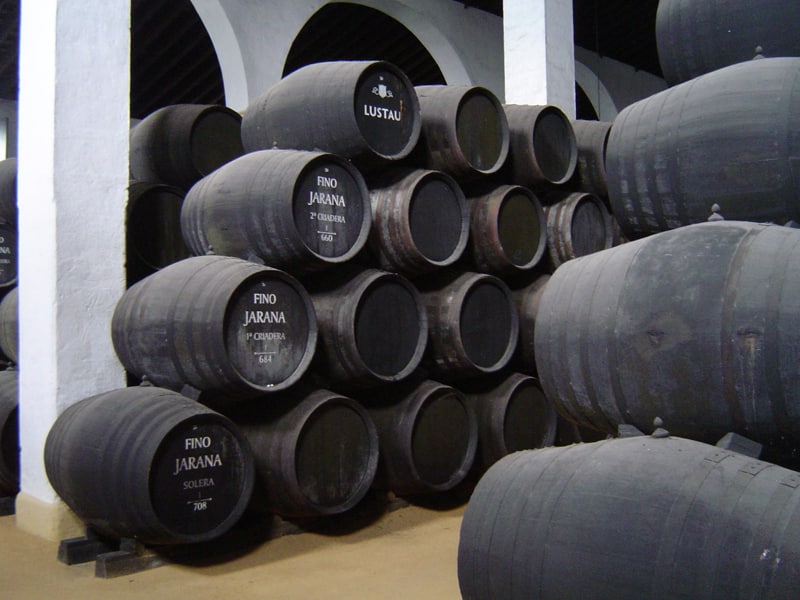 Rows of sherry butts in a winery in Jerez