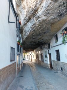 Houses built under the overhaning rocks in Setenil de las Bodegas